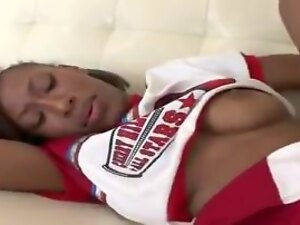A naughty cheerleader receives a rimjob from her teammate, eagerly licking out her tight backdoor.